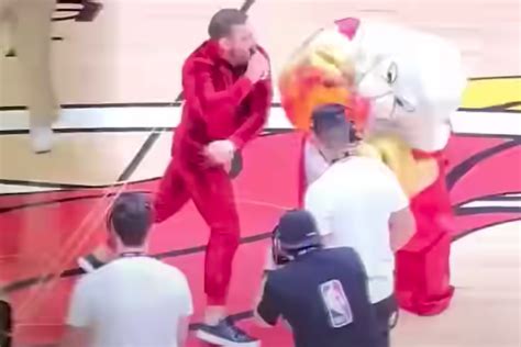 Conor mcgregor delivered a punch to the mascot